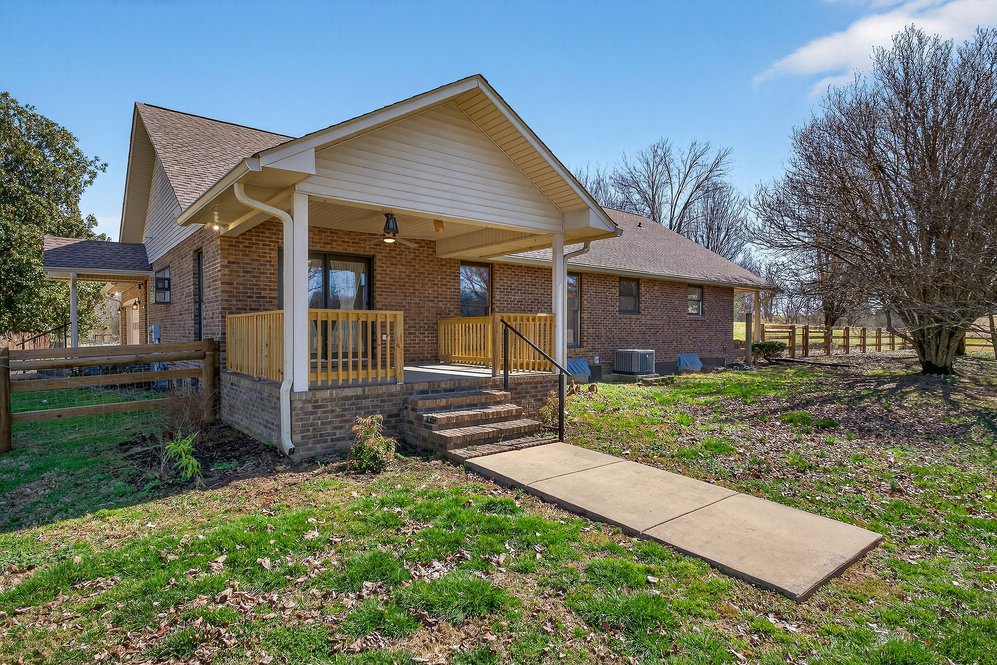3857 Baxter Road Baxter, TN 38544 - Photo 49 of 52 a front view of a house with garden