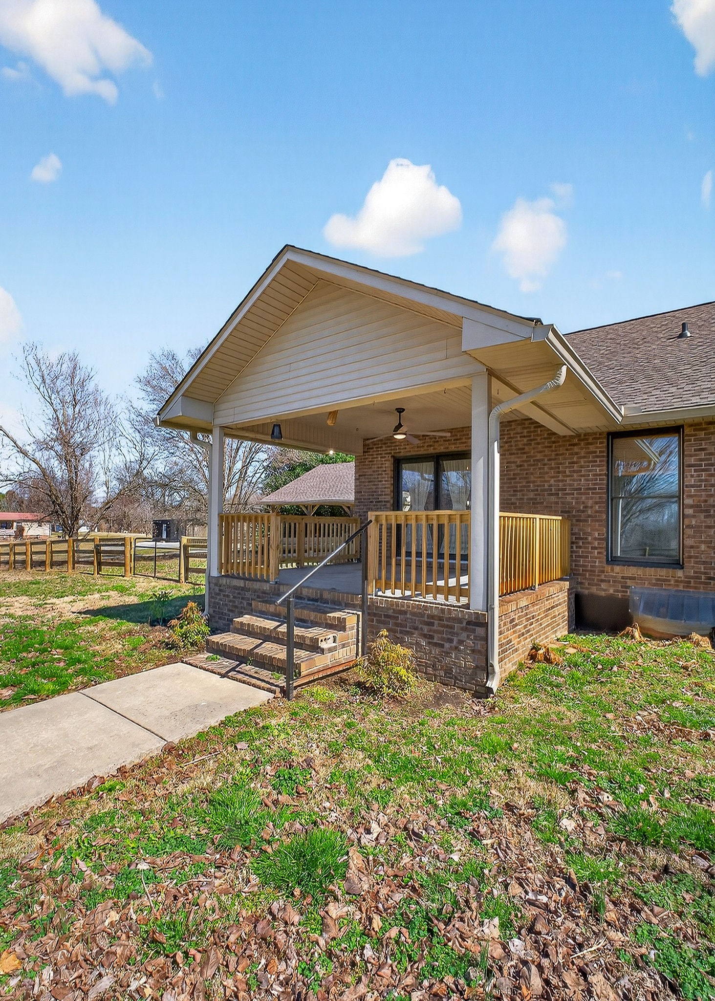 3857 Baxter Road Baxter, TN 38544 - Photo 50 of 52 a view of a house with backyard porch and sitting area