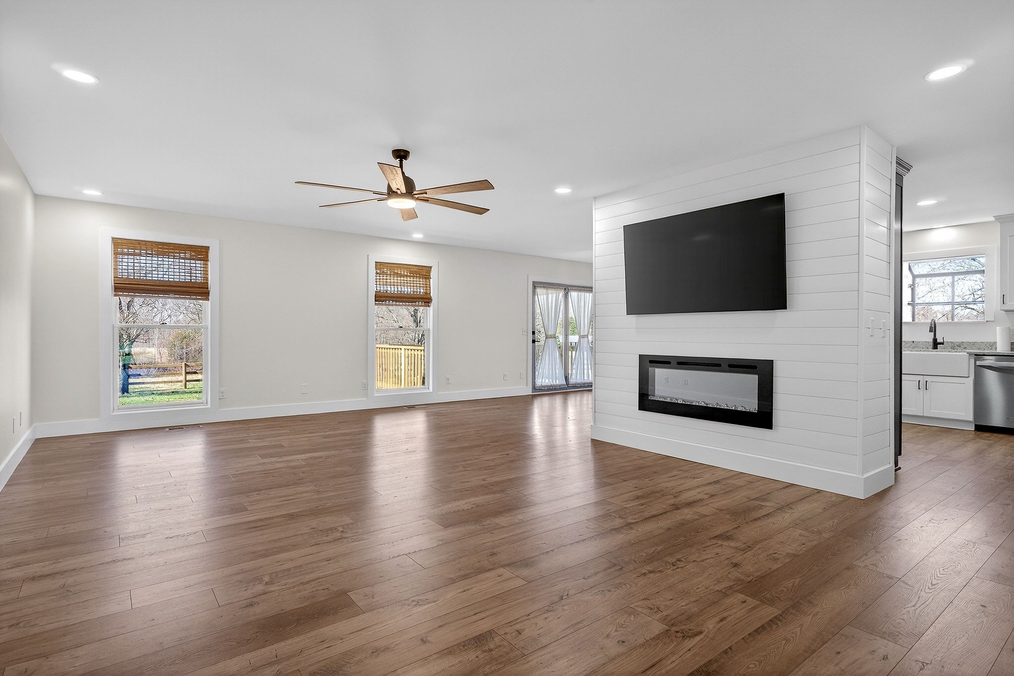 3857 Baxter Road Baxter, TN 38544 - Photo 5 of 52 a view of a livingroom with a fireplace a window and a kitchen