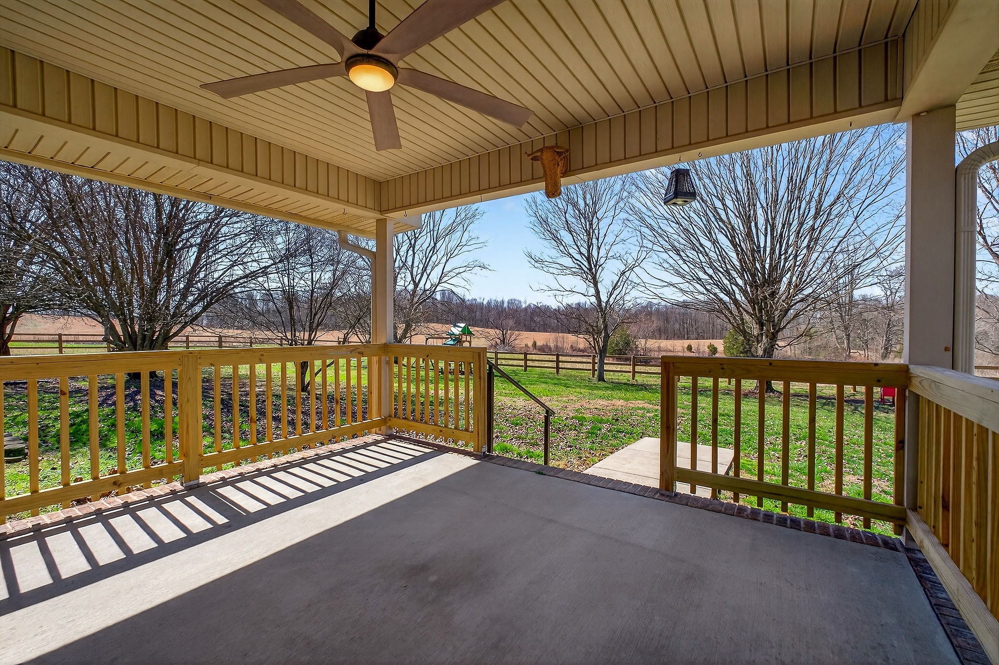 3857 Baxter Road Baxter, TN 38544 - Photo 51 of 52 a view of a porch with a table and chairs