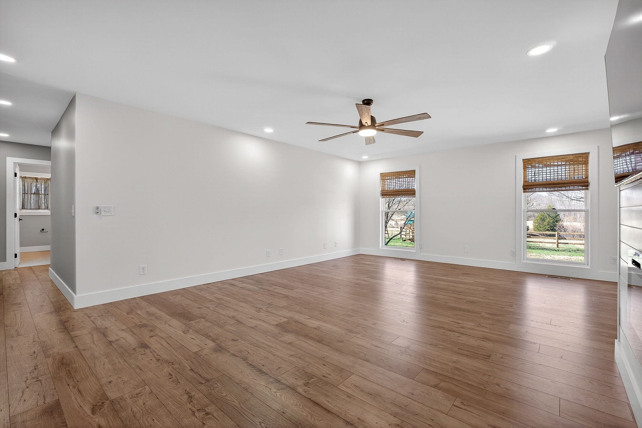 3857 Baxter Road Baxter, TN 38544 - Photo 8 of 52 a view of an empty room with wooden floor and a window