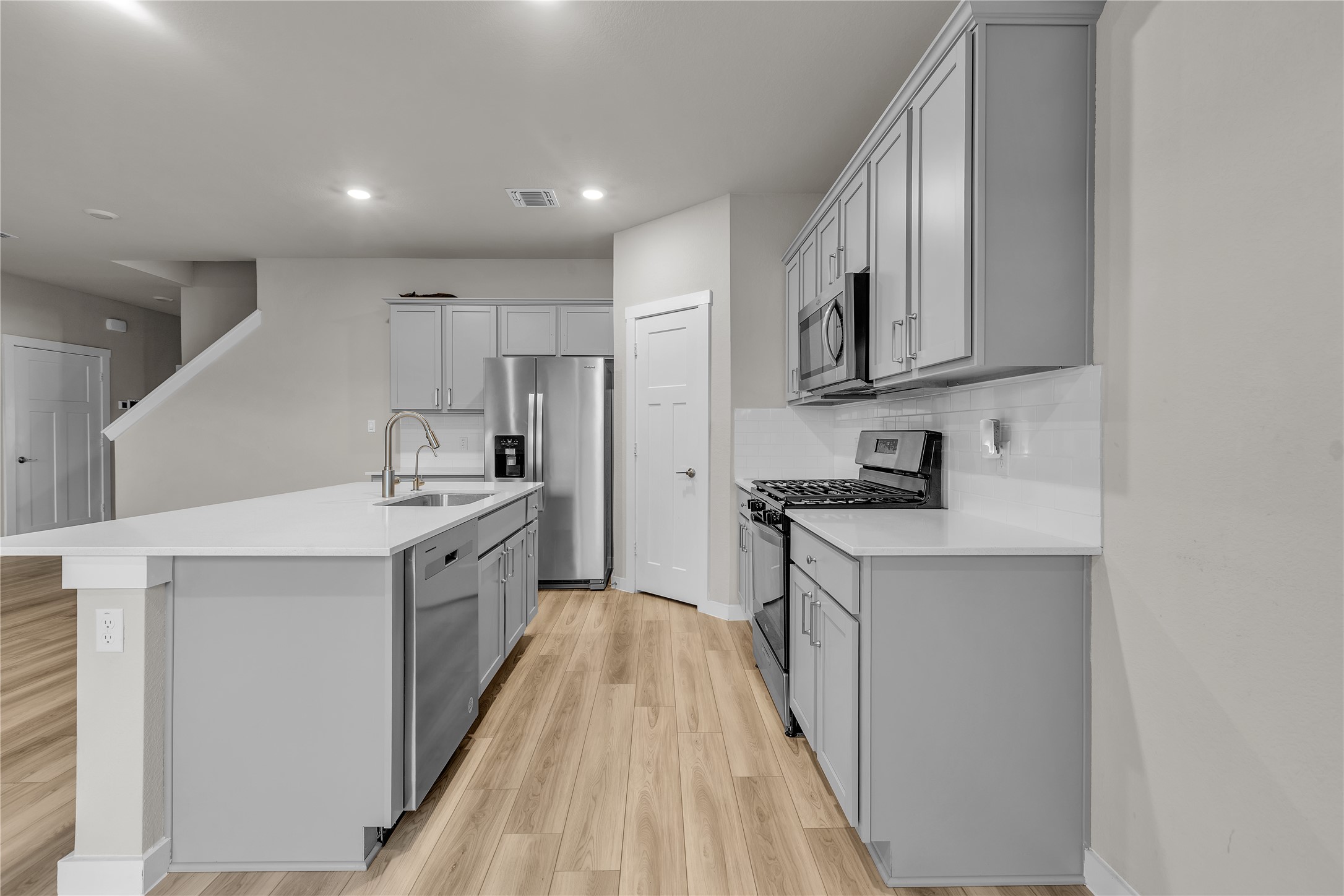 1212 Tipton Street Georgetown, TX 78633 - Photo 7 of 20 Culinary delights await in this modern kitchen with ample counter space and integrated appliances.