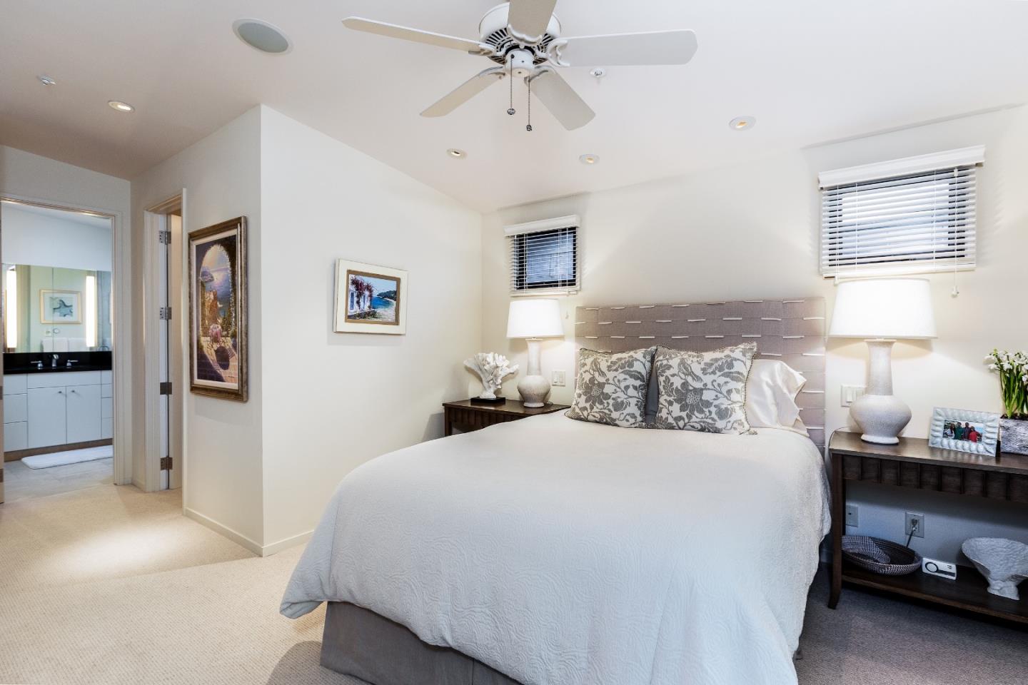 0 Scenic Road Carmel, CA 93923 - Photo 11 of 21 a bedroom with a bed and a chandelier