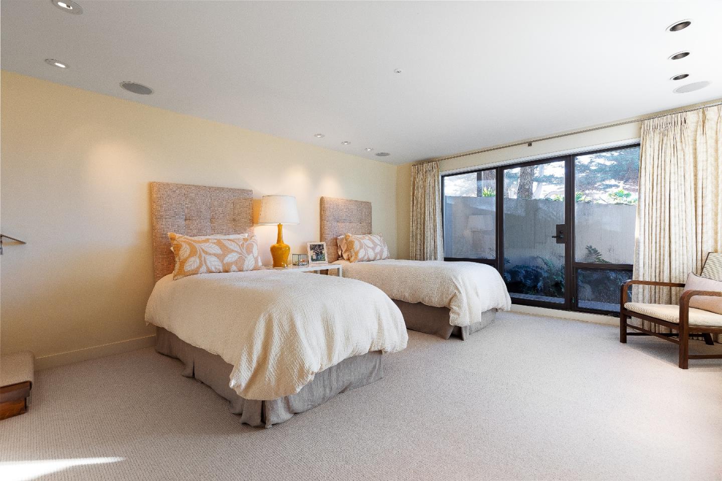 0 Scenic Road Carmel, CA 93923 - Photo 16 of 21 a bedroom with a bed and large windows