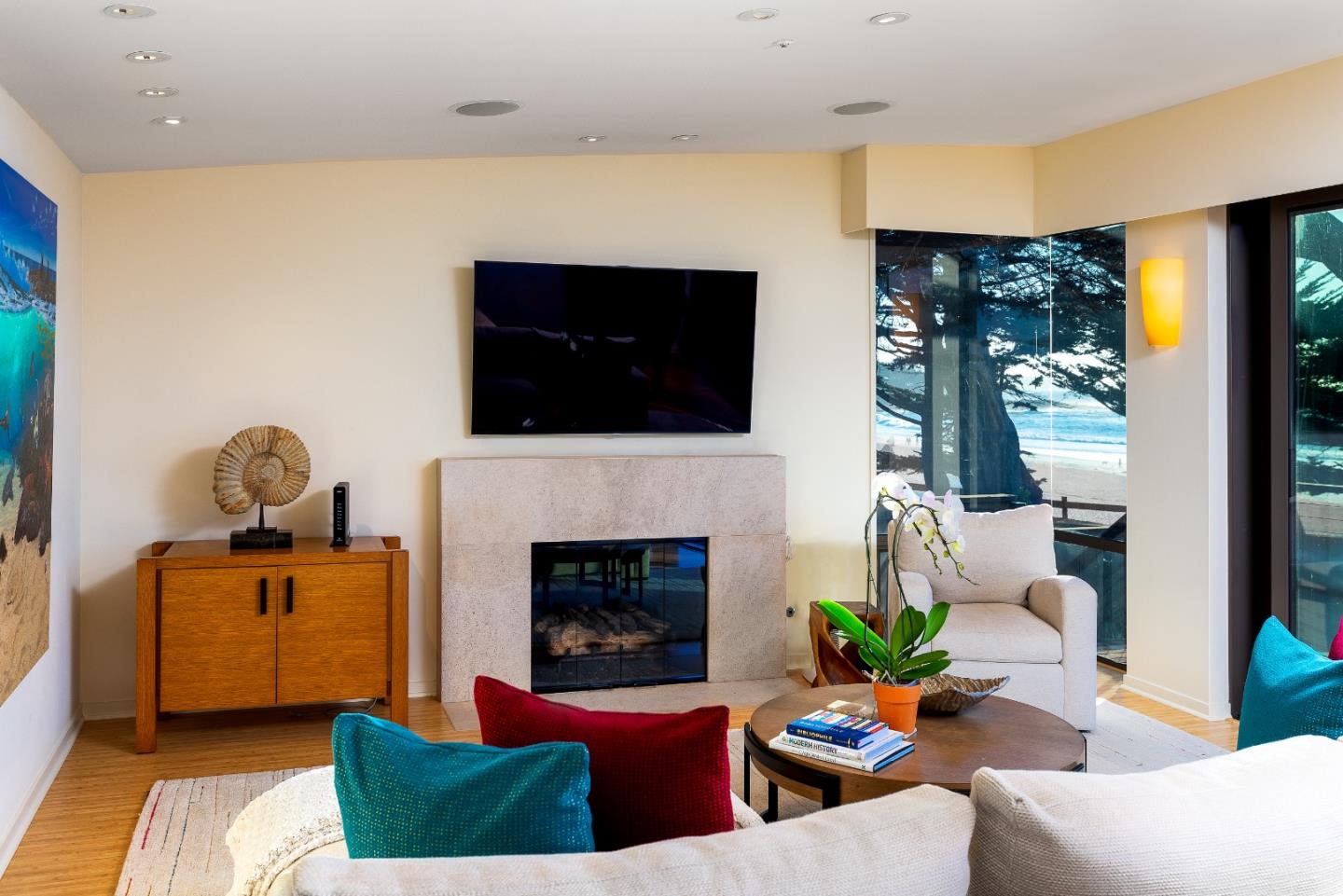 0 Scenic Road Carmel, CA 93923 - Photo 7 of 21 a living room with furniture a flat screen tv and a fireplace