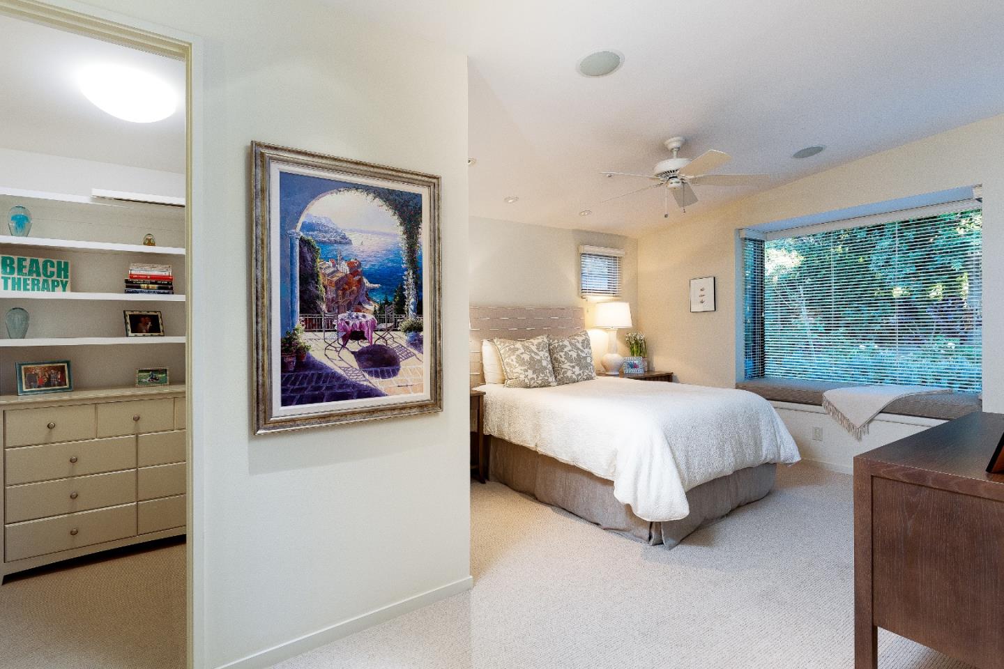 0 Scenic Road Carmel, CA 93923 - Photo 10 of 21 a bedroom with a bed and a painting on the wall