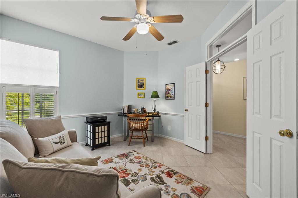 23164 Grassy Pine Drive Estero, FL 33928 - Photo 17 of 43 a living room with furniture and a window