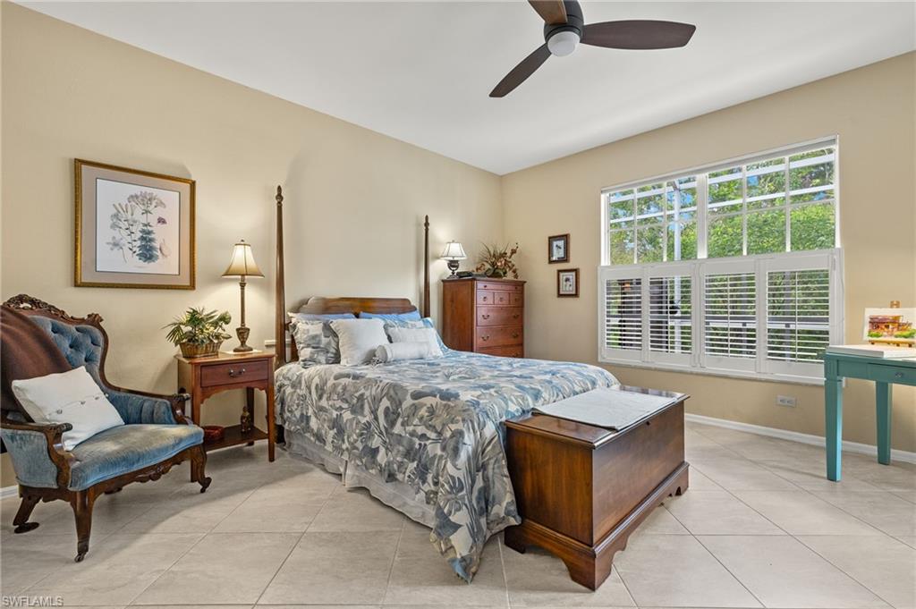 23164 Grassy Pine Drive Estero, FL 33928 - Photo 18 of 43 a living room with furniture and a large window