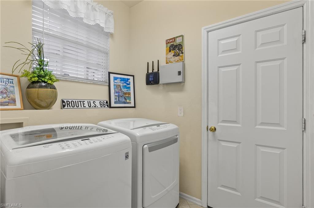 23164 Grassy Pine Drive Estero, FL 33928 - Photo 24 of 43 a view of washer and dryer