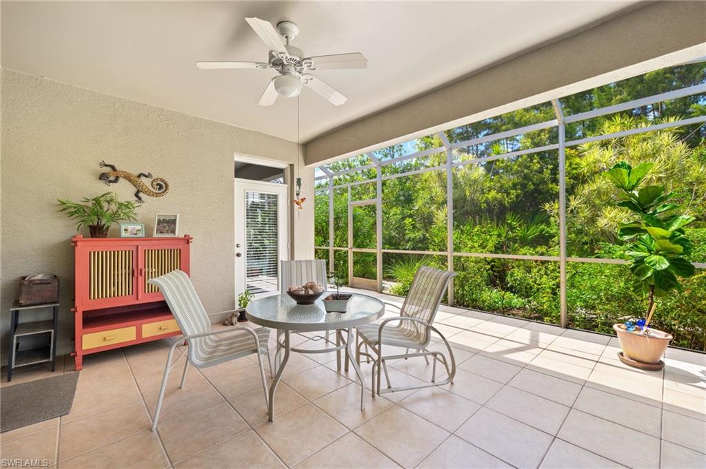23164 Grassy Pine Drive Estero, FL 33928 - Photo 26 of 43 a view of a dining room with furniture window and outside view