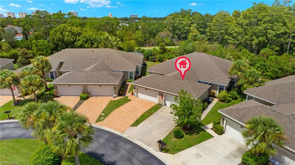 23164 Grassy Pine Drive Estero, FL 33928 - Photo 40 of 43 an aerial view of a house
