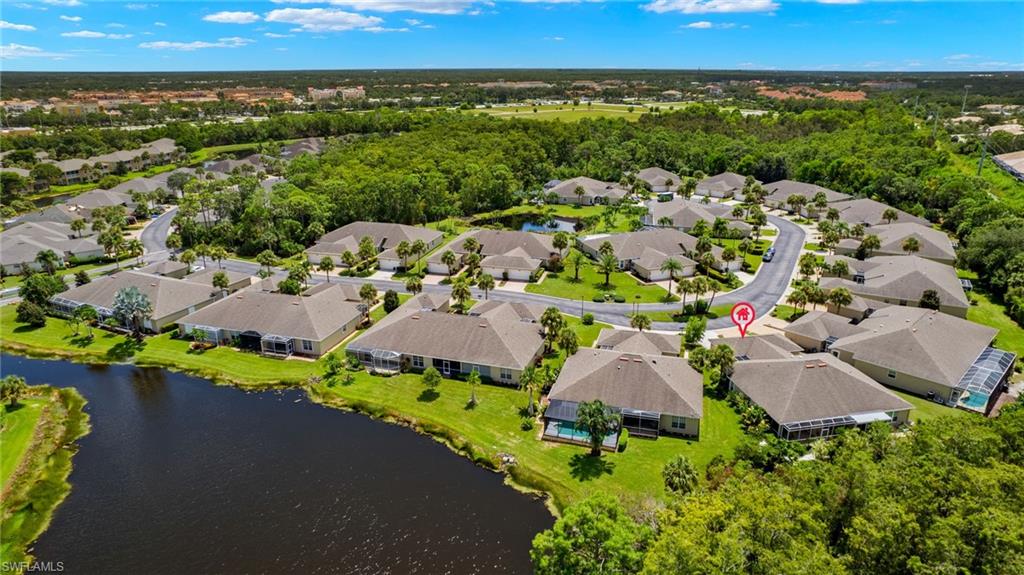 23164 Grassy Pine Drive Estero, FL 33928 - Photo 43 of 43 an aerial view of a house with a garden
