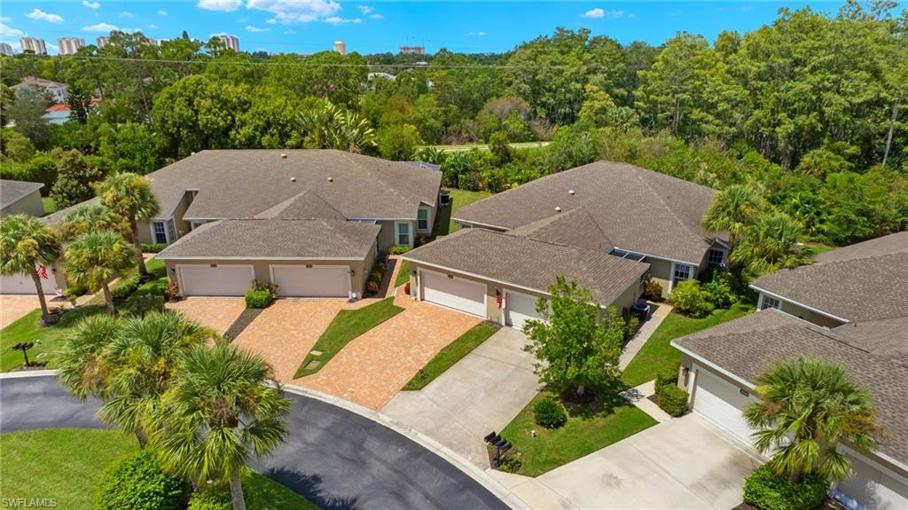 23164 Grassy Pine Drive Estero, FL 33928 - Photo 5 of 43 an aerial view of a house