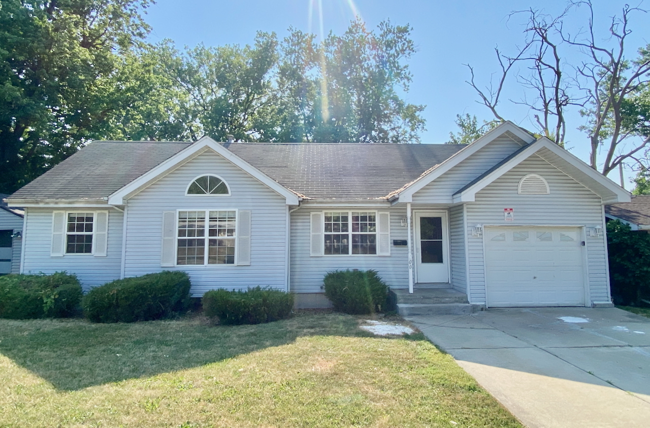 200 Durham Drive Steger, IL 60475 - Photo 1 of 26 a view of a yard in front of house