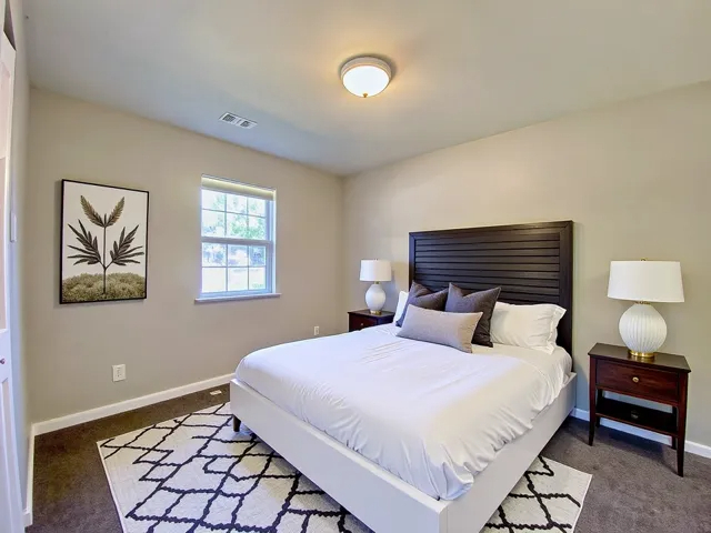 200 Durham Drive Steger, IL 60475 - Photo 14 of 26 a bedroom with a bed and a lamp