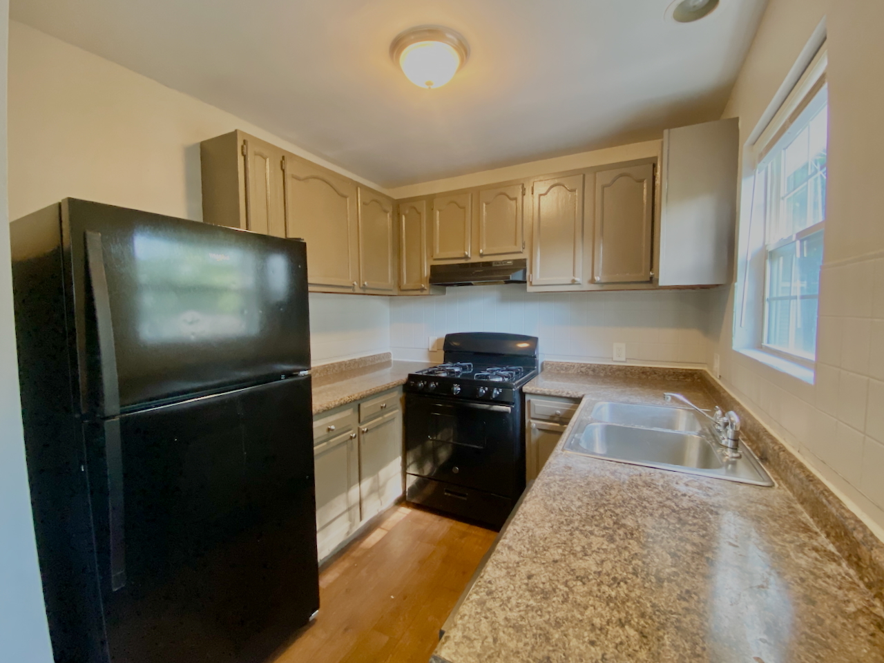 200 Durham Drive Steger, IL 60475 - Photo 5 of 26 a kitchen with a refrigerator stove and sink