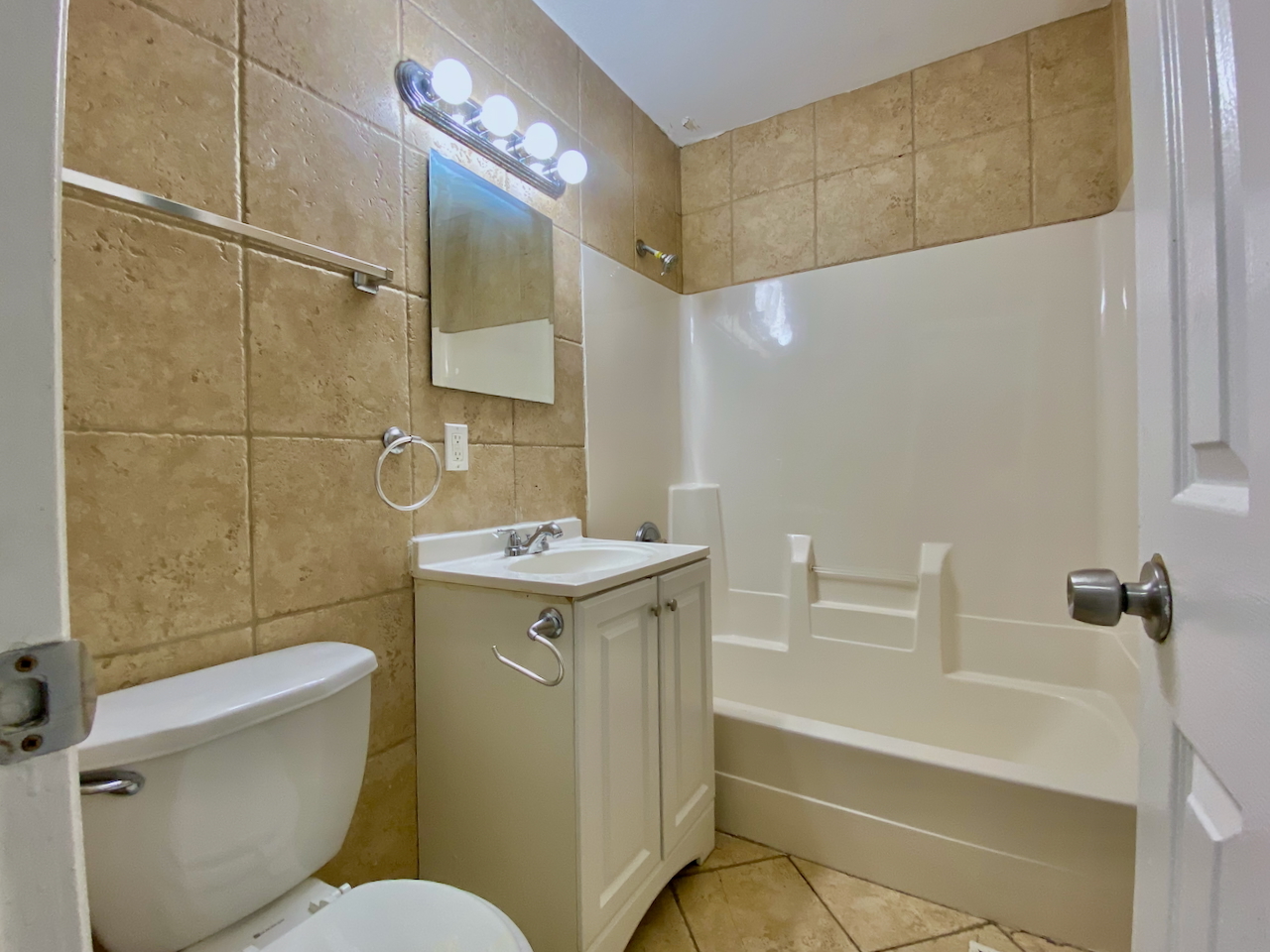 200 Durham Drive Steger, IL 60475 - Photo 9 of 26 a bathroom with a sink mirror vanity and toilet