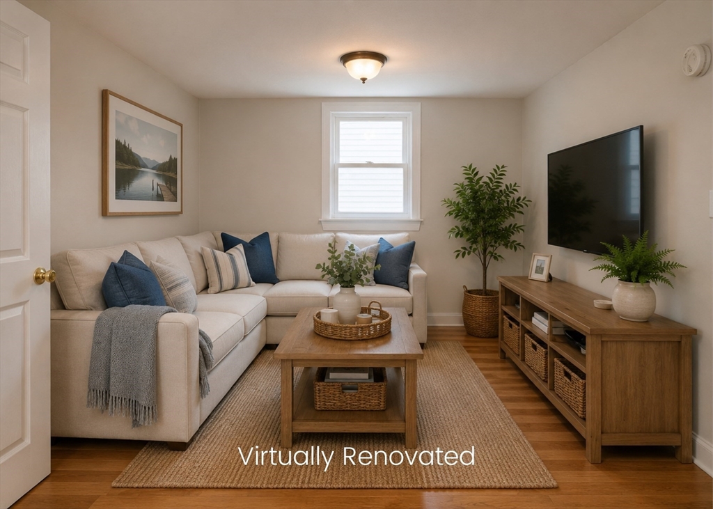 9 Morrison Way Lakeville, MA 02347 - Photo 10 of 28 a living room with furniture and a flat screen tv