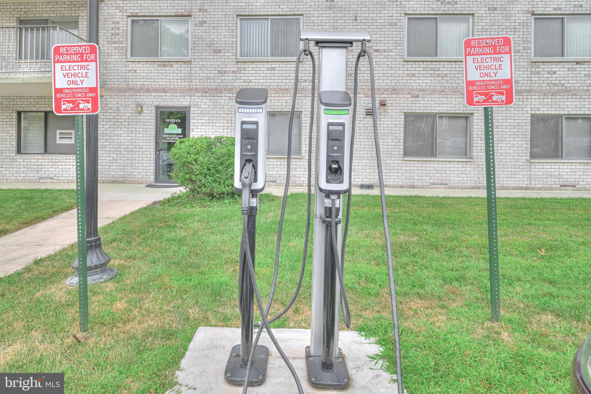 1111 University Boulevard West, Unit 611A Silver Spring, MD 20902 - Photo 21 of 26 a front view of a house with a garden and plants