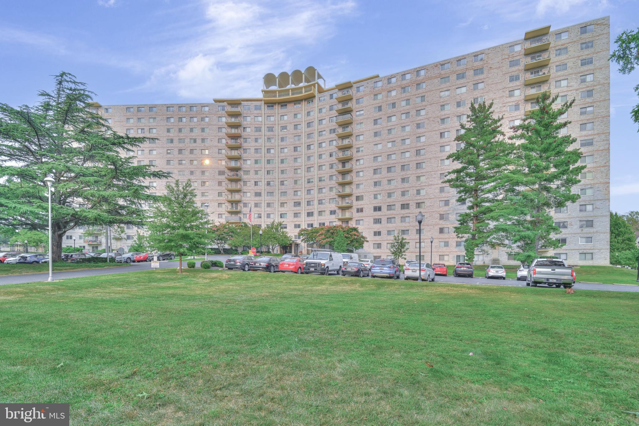 1111 University Boulevard West, Unit 611A Silver Spring, MD 20902 - Photo 25 of 26 a view of a building with garden