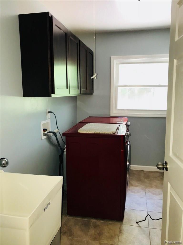 18893 Haggerty Road Belleville, MI 48111 - Photo 34 of 44 Haggerty Laundry Room. Washer and Dryer stay