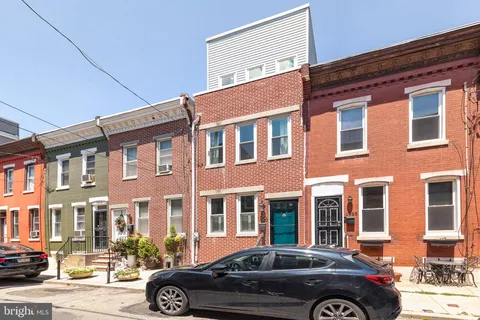 a car parked in front of a building