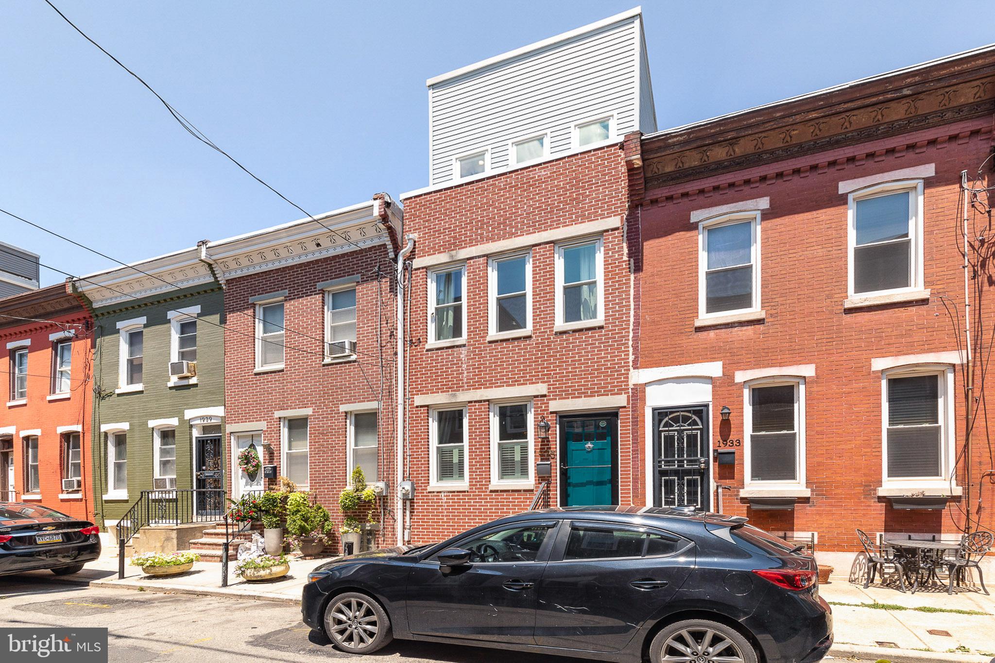 1935 Cambridge Street Philadelphia, PA 19130 - Photo 2 of 54 a car parked in front of a building