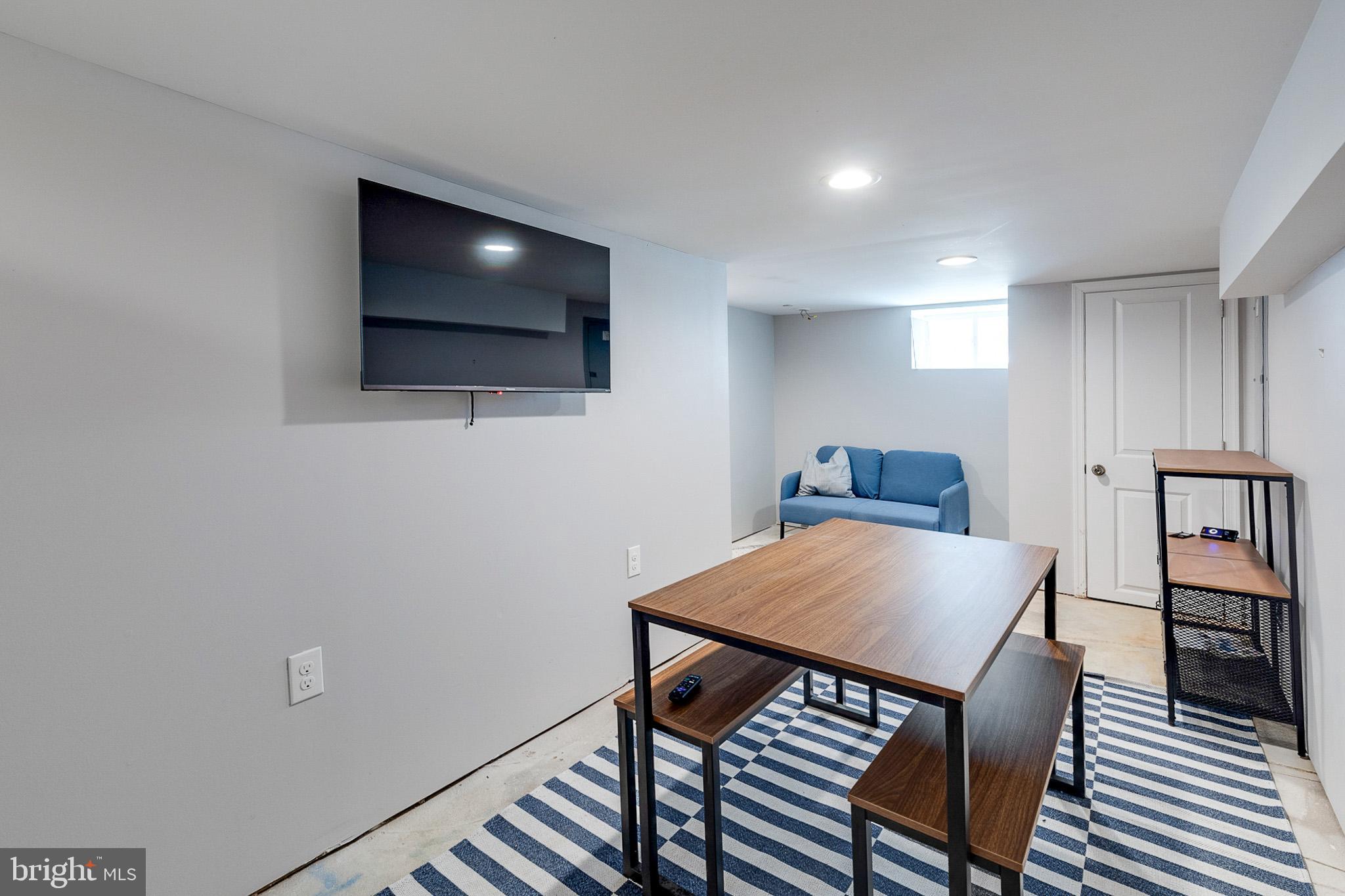 1935 Cambridge Street Philadelphia, PA 19130 - Photo 34 of 54 a view of a dining room with furniture and wooden floor