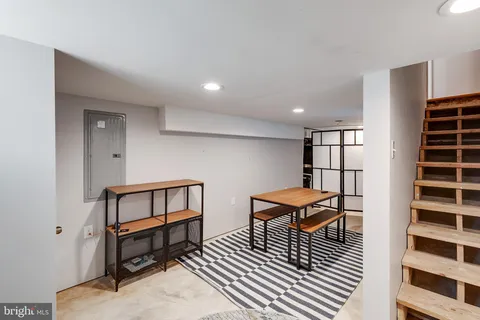 a buildings covered with tall trees