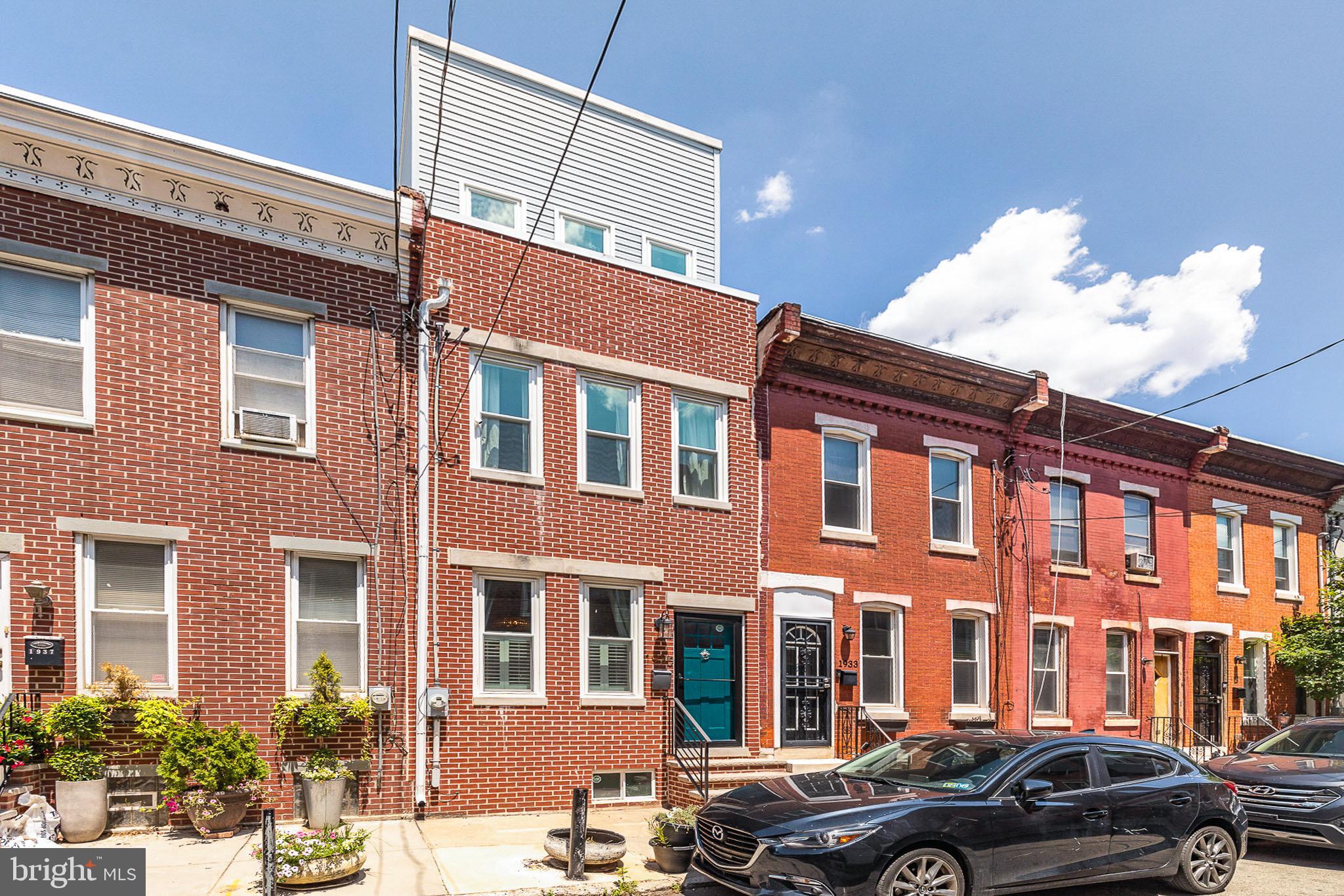 1935 Cambridge Street Philadelphia, PA 19130 - Photo 46 of 54 a couple of cars is parked in front of a building