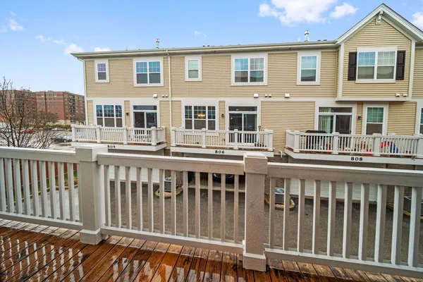 a balcony with a a deck