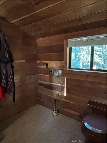 a kitchen with a sink appliances and cabinets