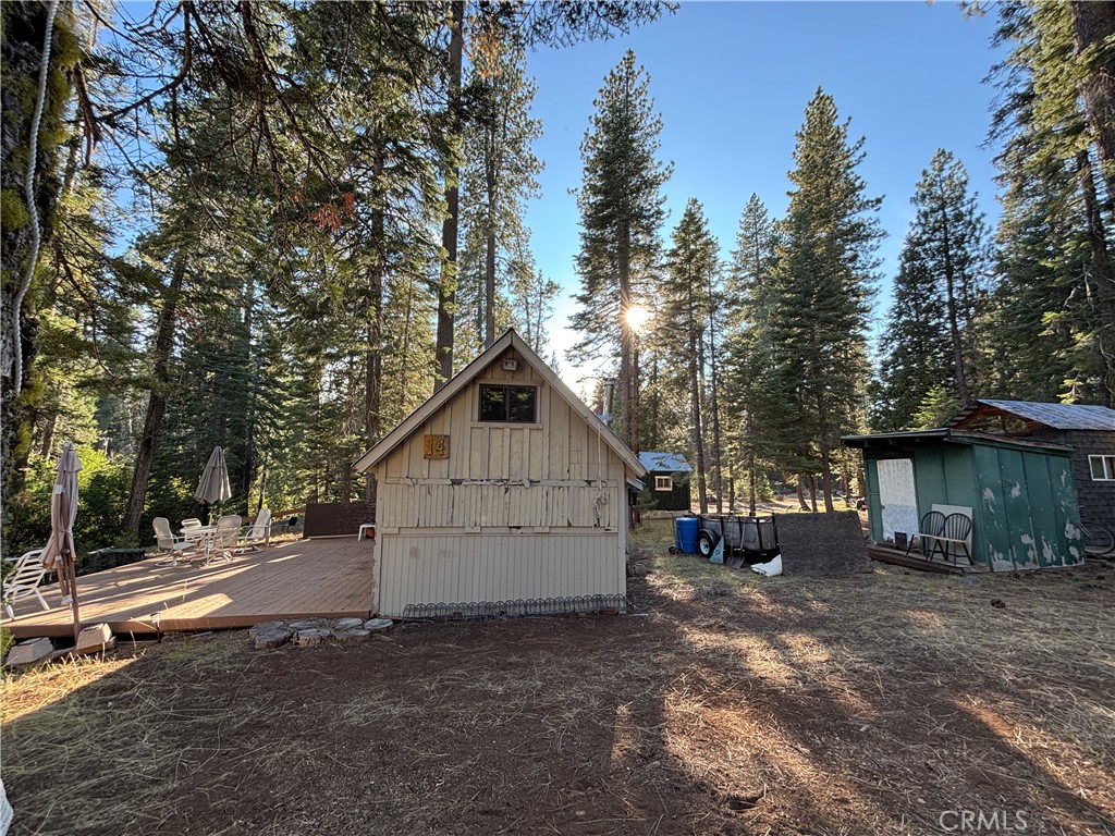 9478 Jones Creek Road, Unit 14 Forest Ranch, CA 95942 - Photo 24 of 35 a view of a house with a yard and tree s