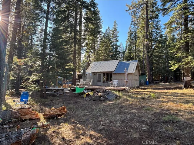 a view of a back yard of the house