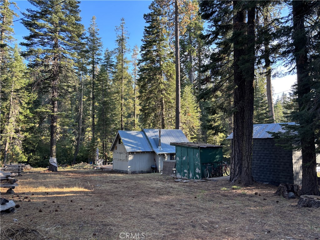 9478 Jones Creek Road, Unit 14 Forest Ranch, CA 95942 - Photo 33 of 35 a couple of table and chairs in front of a house
