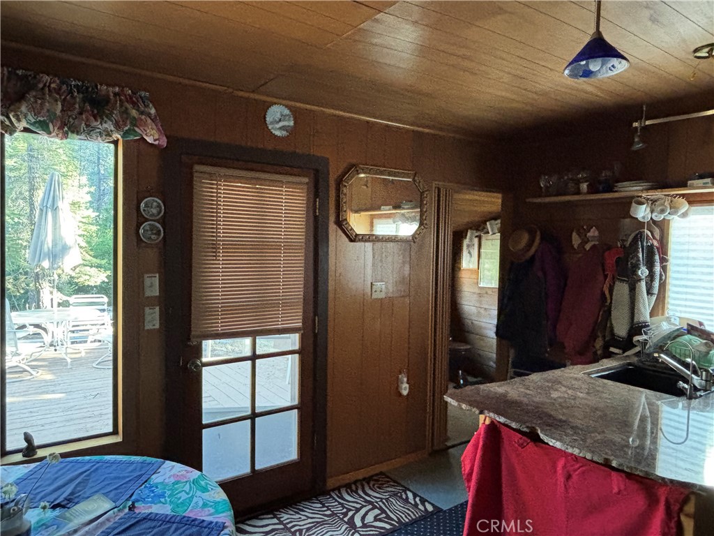 9478 Jones Creek Road, Unit 14 Forest Ranch, CA 95942 - Photo 10 of 35 a bathroom with a granite countertop sink and a mirror