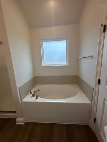 a bathroom with a bathtub