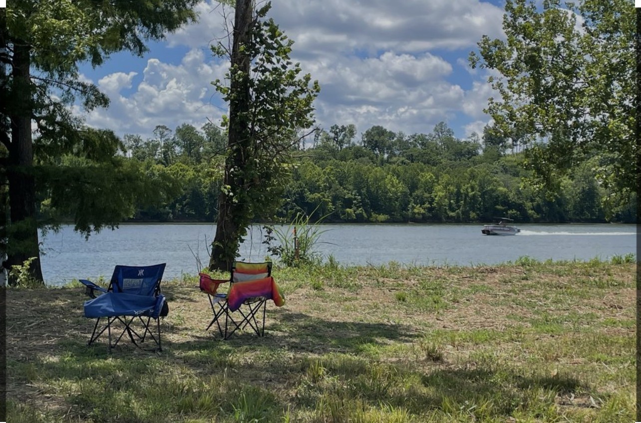 0 Wc Pickett Road Clifton, TN 38425 - Photo 4 of 5 a backyard of a house with table and chairs