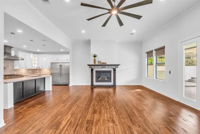 a view of a kitchen with a sink and a stove