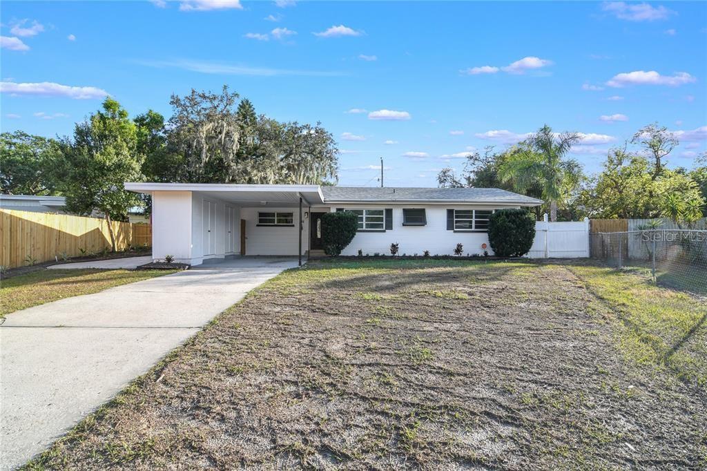 218 Rhea Circle Lakeland, FL 33813 - Photo 1 of 1 a house view with a garden space