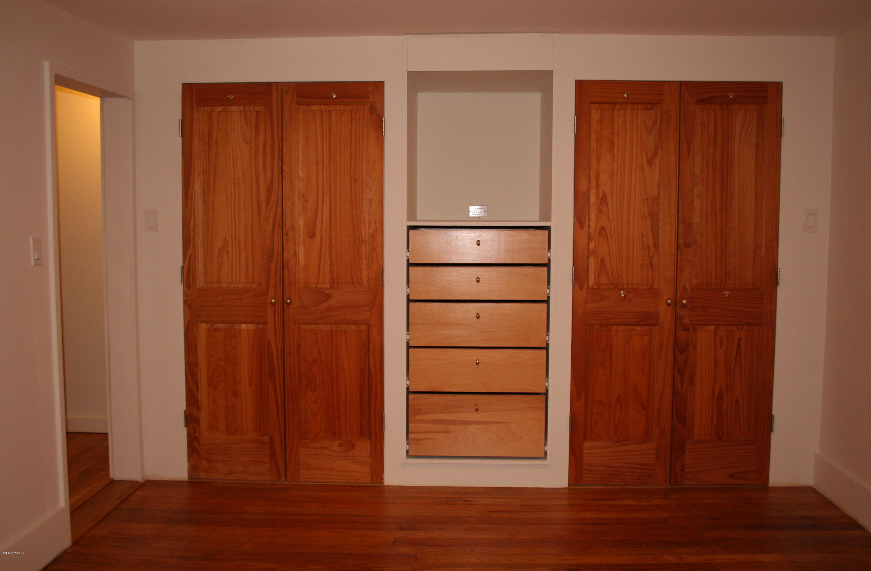 945 State Road Richmond, MA 01254 - Photo 12 of 32 an empty room with wooden floor