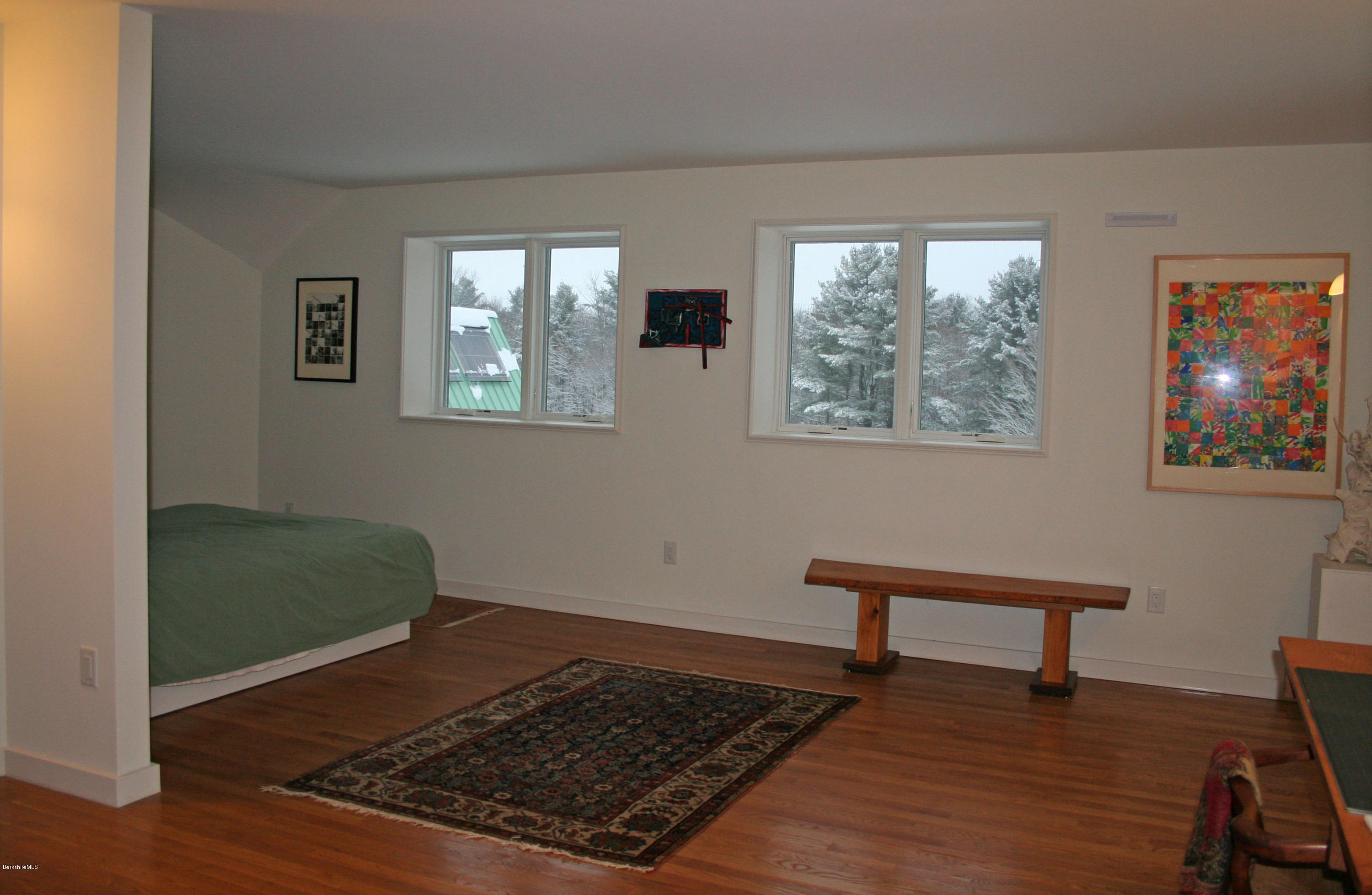 945 State Road Richmond, MA 01254 - Photo 13 of 32 a room with window and a wooden floor