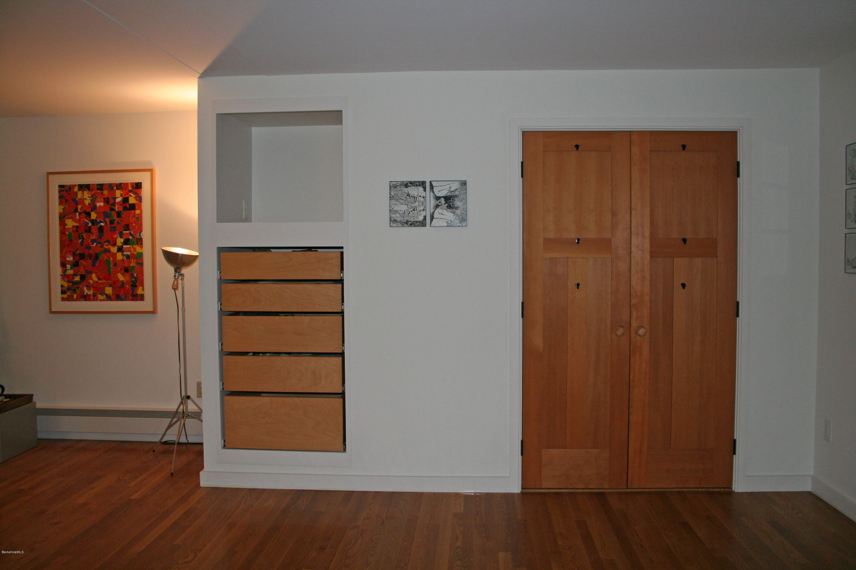 945 State Road Richmond, MA 01254 - Photo 15 of 32 an empty room with wooden floor and closet