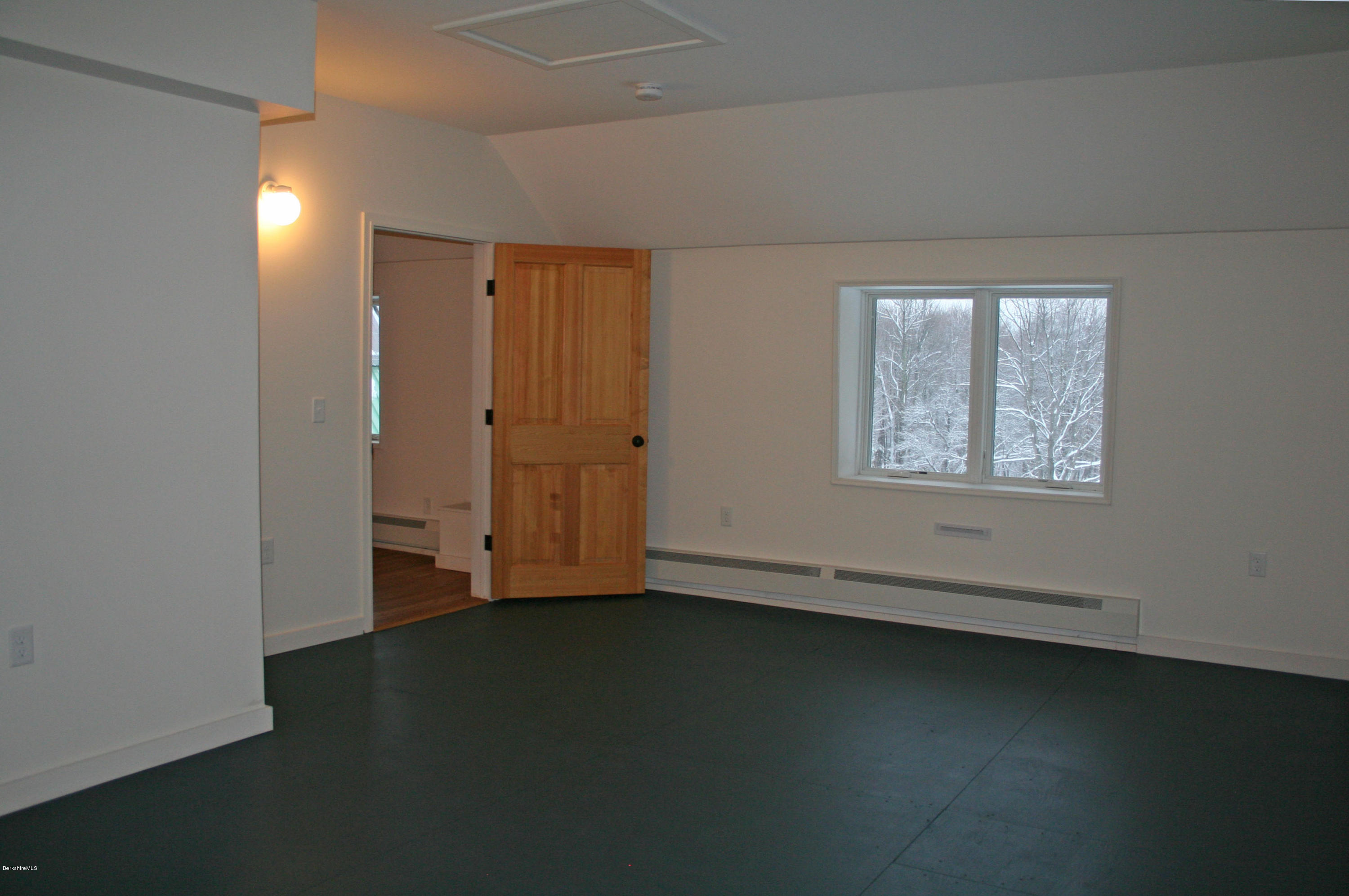 945 State Road Richmond, MA 01254 - Photo 18 of 32 an empty room with a door