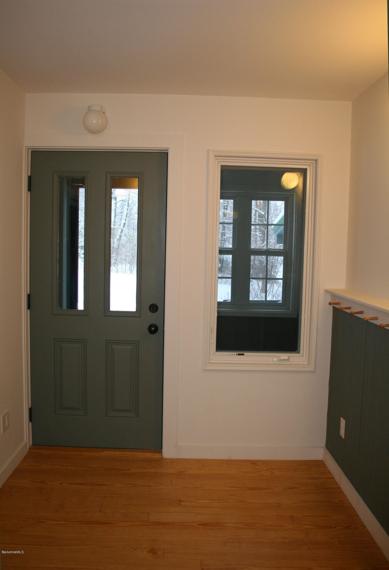 945 State Road Richmond, MA 01254 - Photo 23 of 32 a view of an empty room with wooden floor and a window