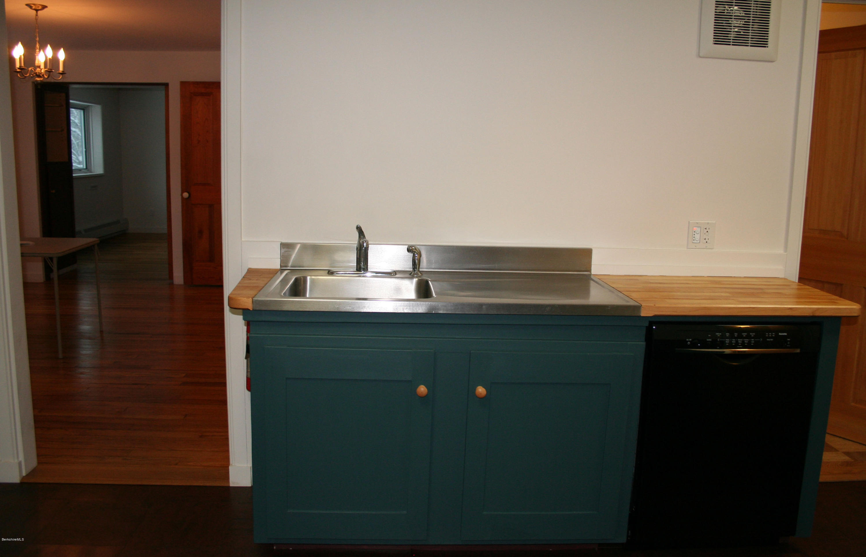 945 State Road Richmond, MA 01254 - Photo 25 of 32 a bathroom with a sink and a mirror