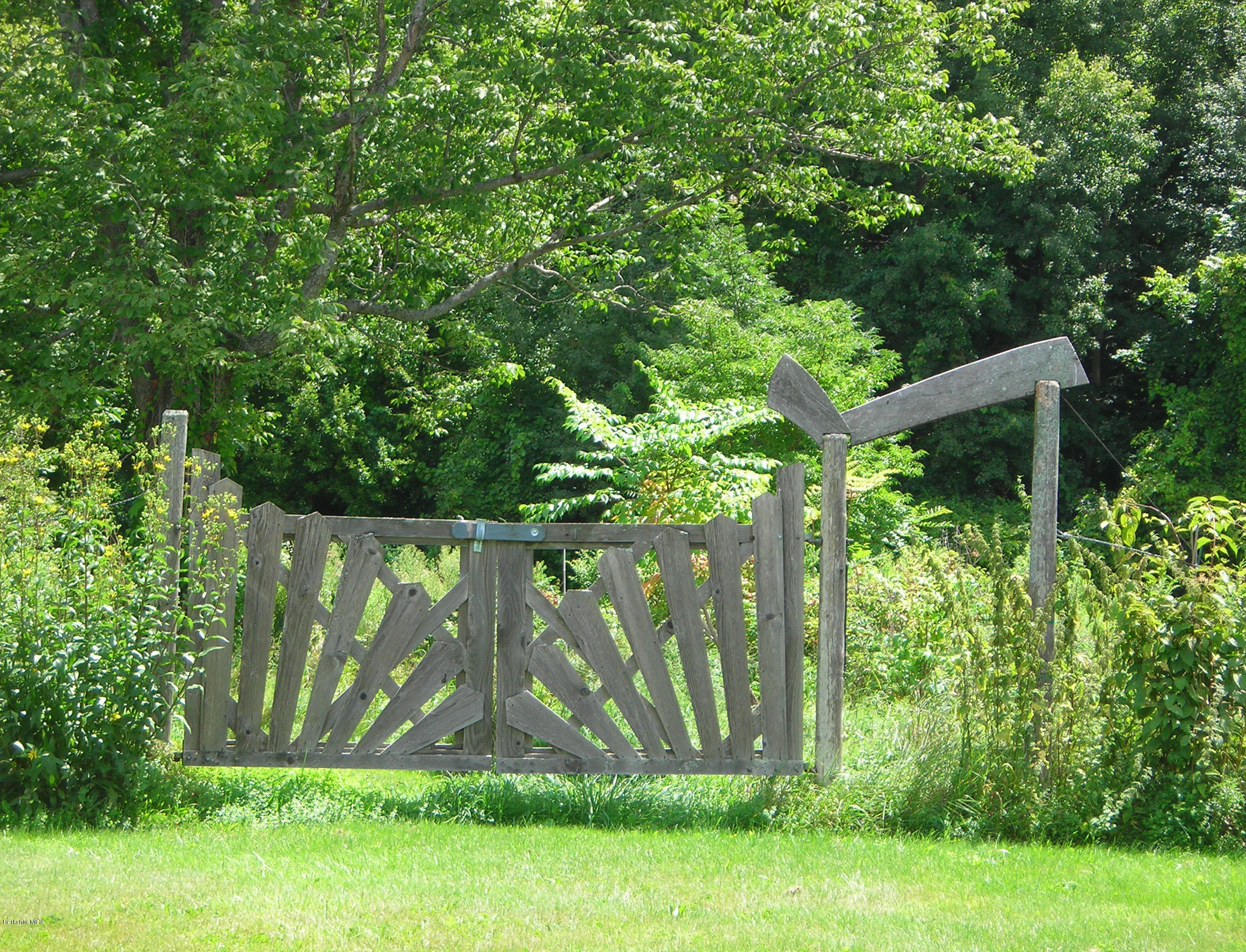 945 State Road Richmond, MA 01254 - Photo 29 of 32 a view of a yard with a tree
