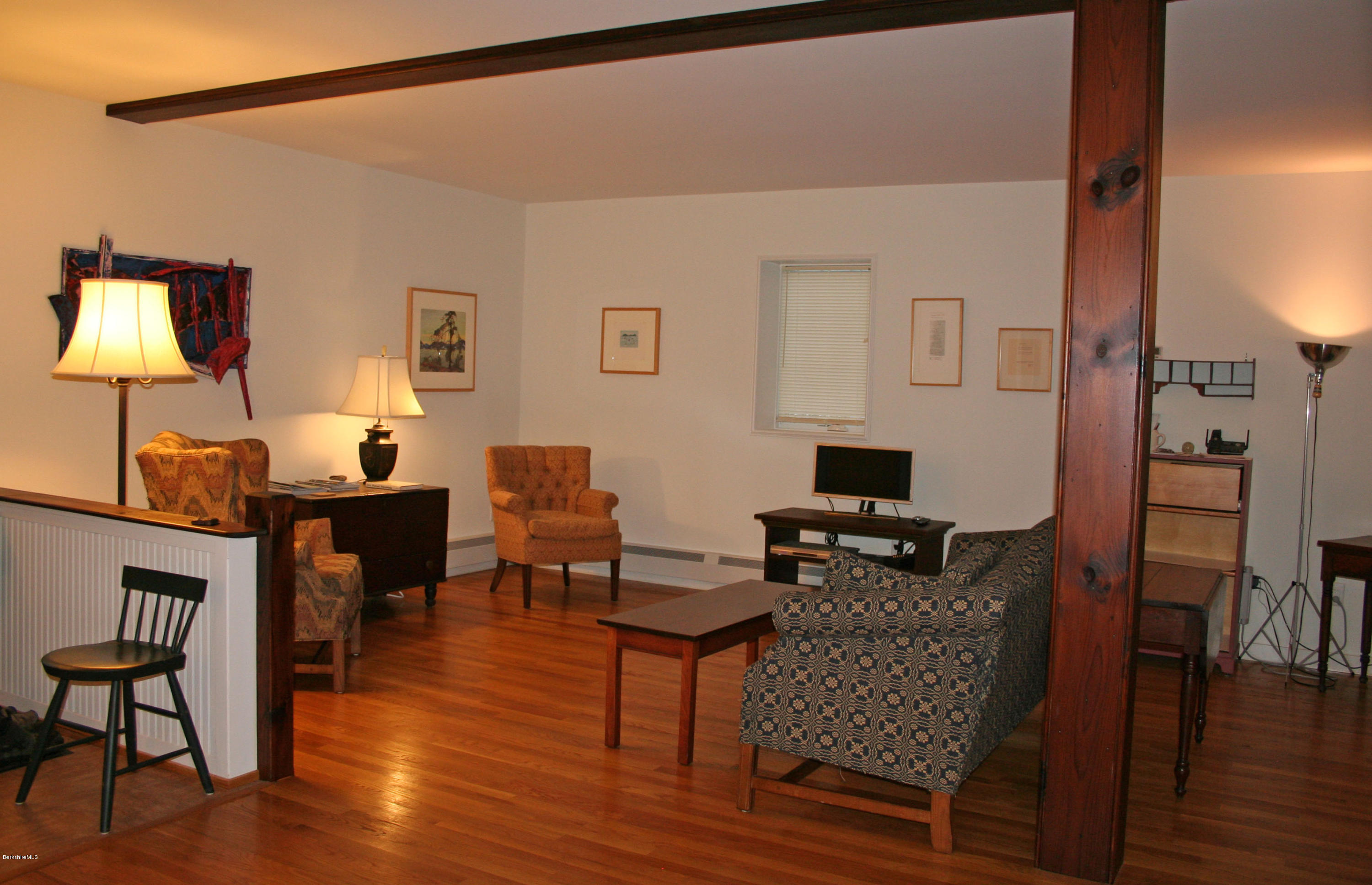945 State Road Richmond, MA 01254 - Photo 8 of 32 a living room with furniture and a wooden floor