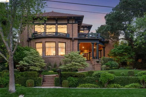 front view of a house with a small yard