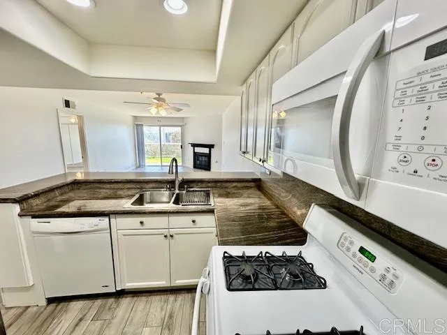a kitchen with a stove and a sink